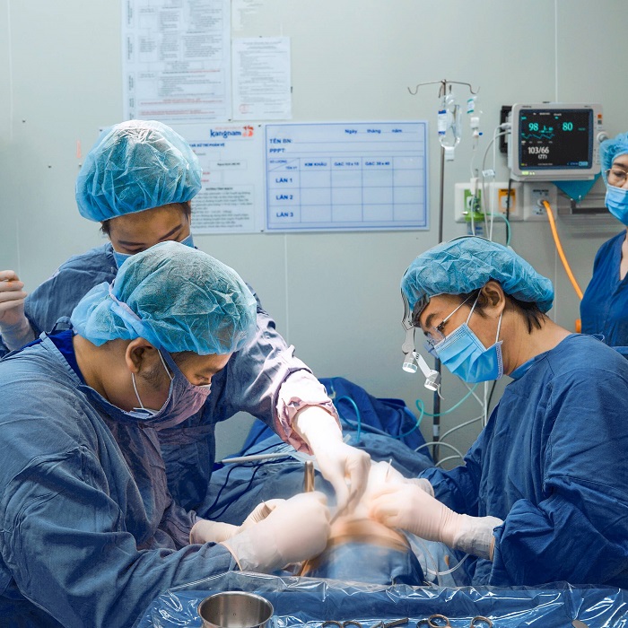 Dr. Richard Huy and his team of doctors perform surgery for a customer.