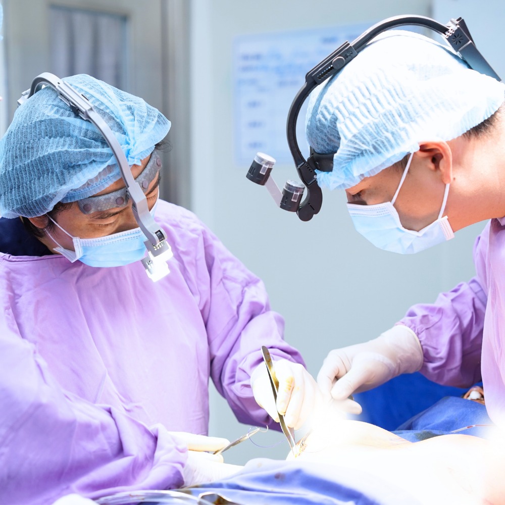 Doctor performing surgery in the operating room